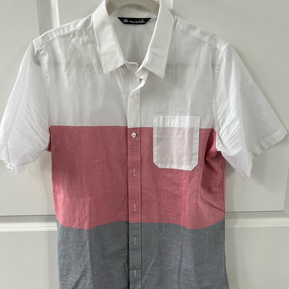 Travis Mathew short sleeve collared shirt.